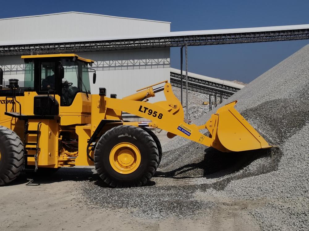 LTMG wheel loader working in the sand